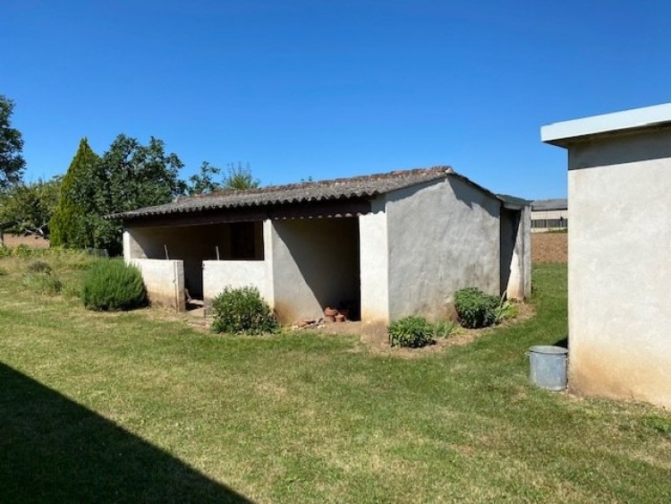 Property for Sale in 19th C Farmhouse and outbuildings in the Lot valley, Lot, Occitanie, France