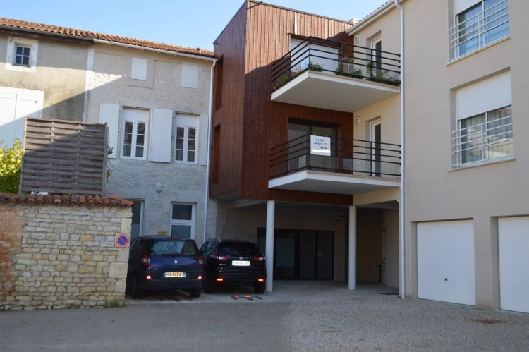 Property for Sale in Ideal location - two bedroom flat with balcony and garage in a residence with lift, Charente, Near Ruffec, Charente, Nouvelle-Aquitaine, France