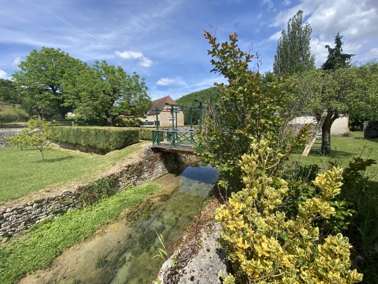 Property for Sale in Magnificent village house in a pretty wooded park crossed by a stream., Lot, Occitanie, France