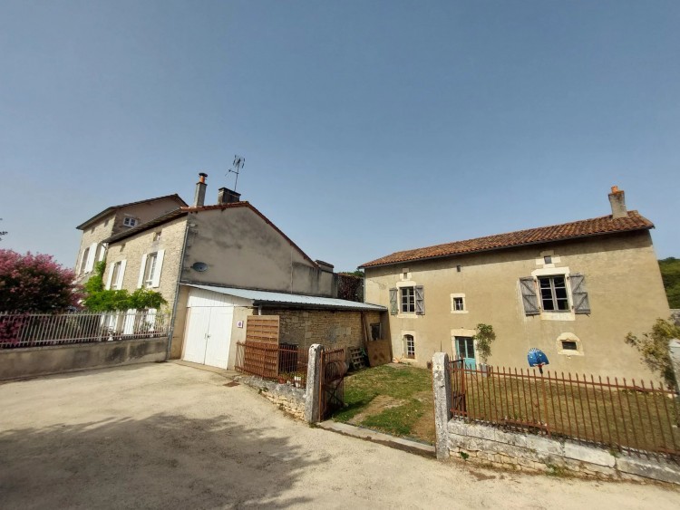 Property for Sale in Beautiful renovated 5 bed character village home, a second house to renovate, outbuildings and garden, Vienne, Near Voulême, Vienne, Nouvelle-Aquitaine, France