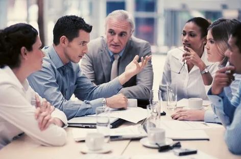 Professionals round a table