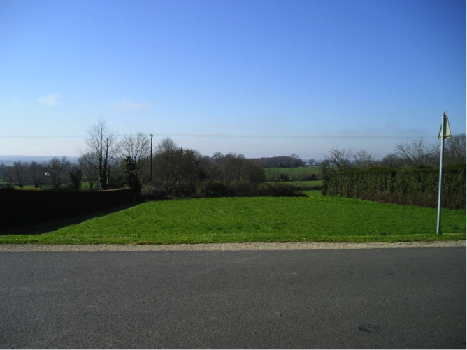 Large empty plot for a new build in France