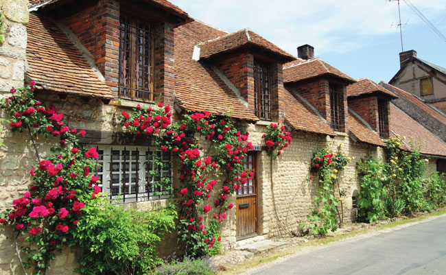 The flower festooned streets of Yèvre-le-Châtel near Orléans have inspired artists for generations