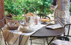 Have every meal you can outside on a outdoor round table